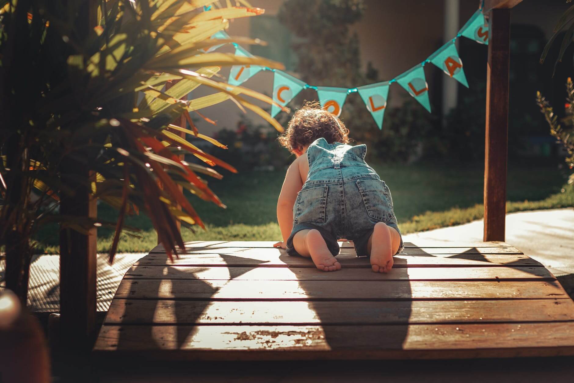 little boy on a deck