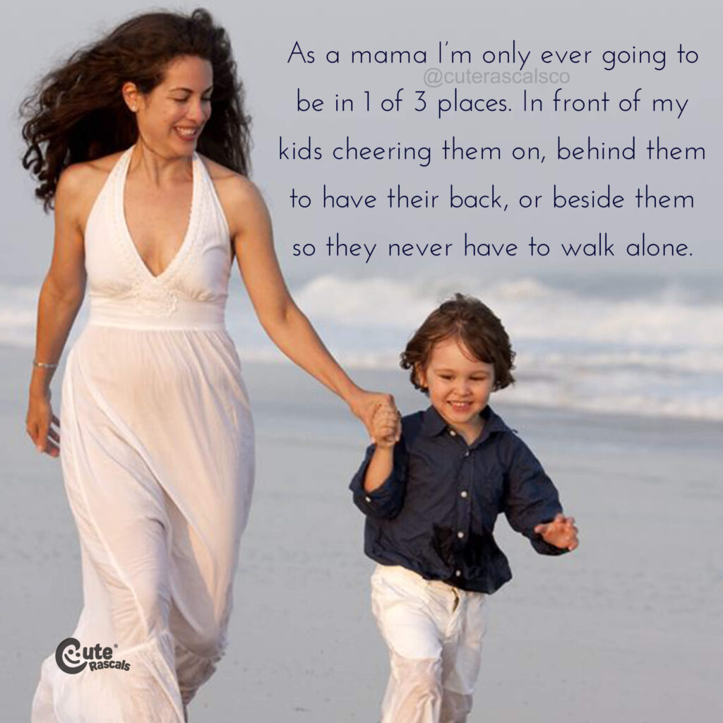 Mom and son walking by the beach. Mom quote.