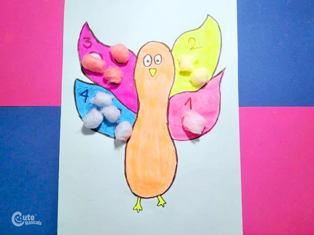 Turkey cotton wings. A Montessori fine motor skills activity for kids