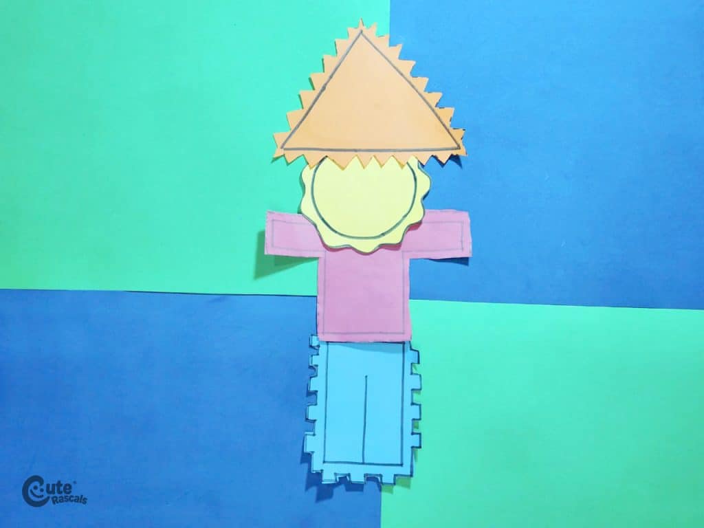 Final result of cut out scarecrow activity for kids. Teaching kids how to use scissors activity