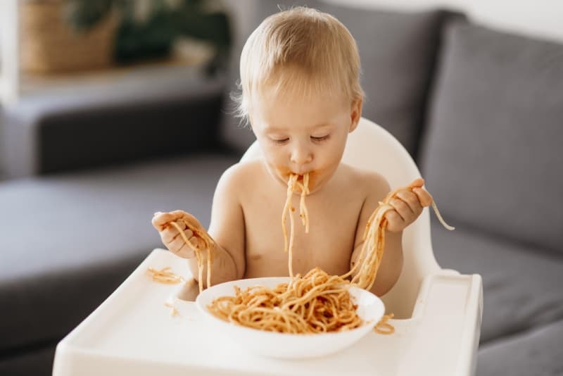 Child eating with hands