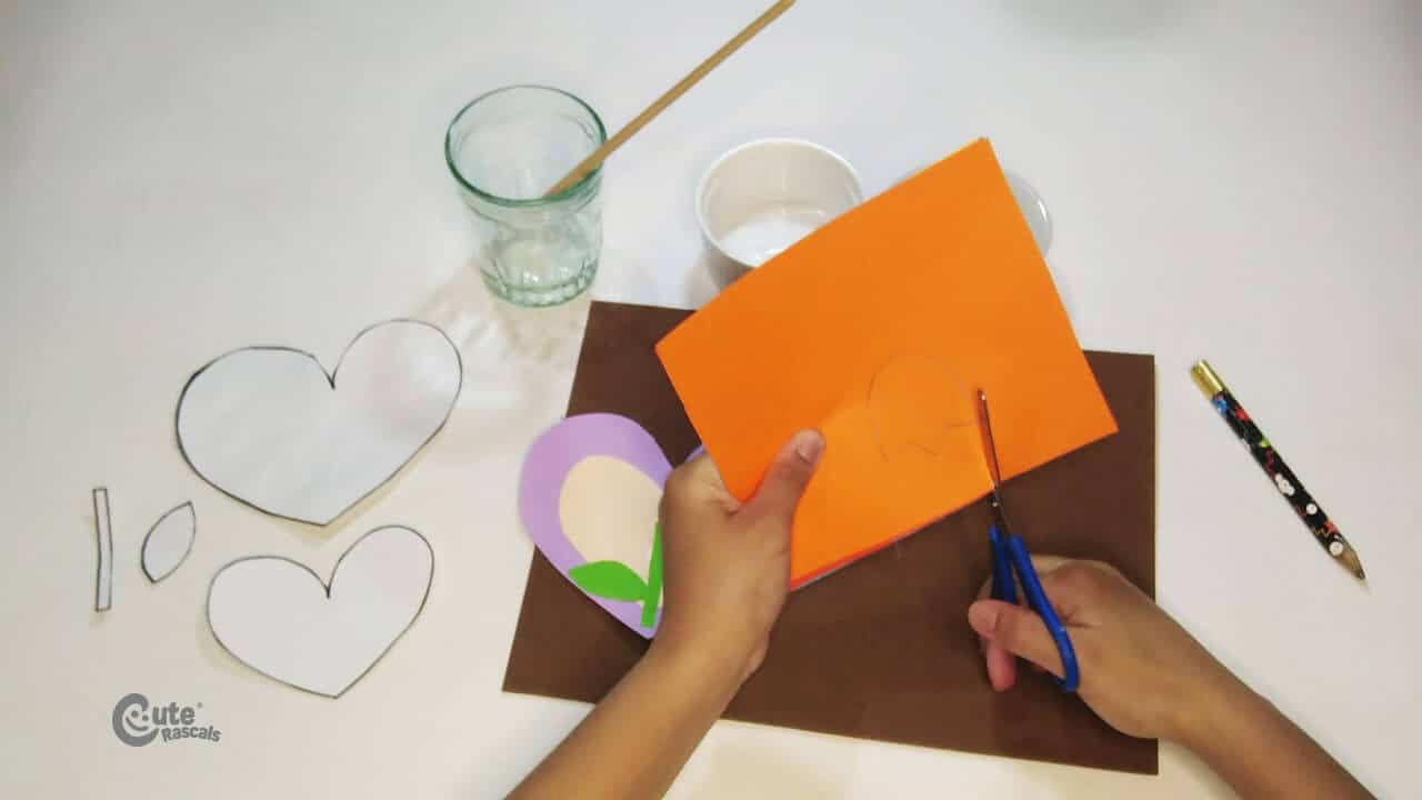 Cutting flowers for Valentines day card for kids