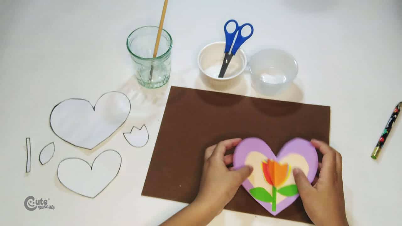 Gluing the flower to heart