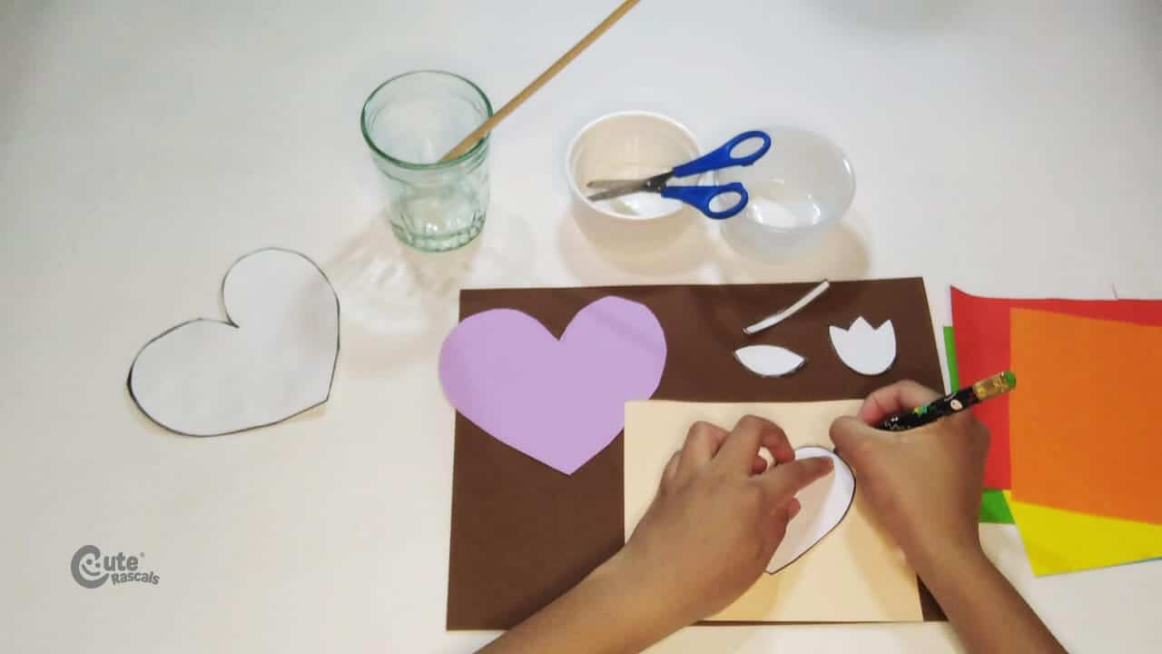 Cutting small heart for valentine card