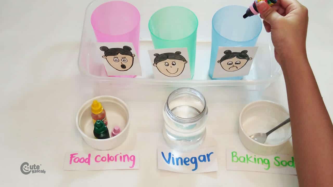Add food coloring to the baking soda.