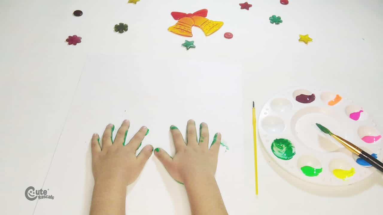 make the tree leaves with the handprints