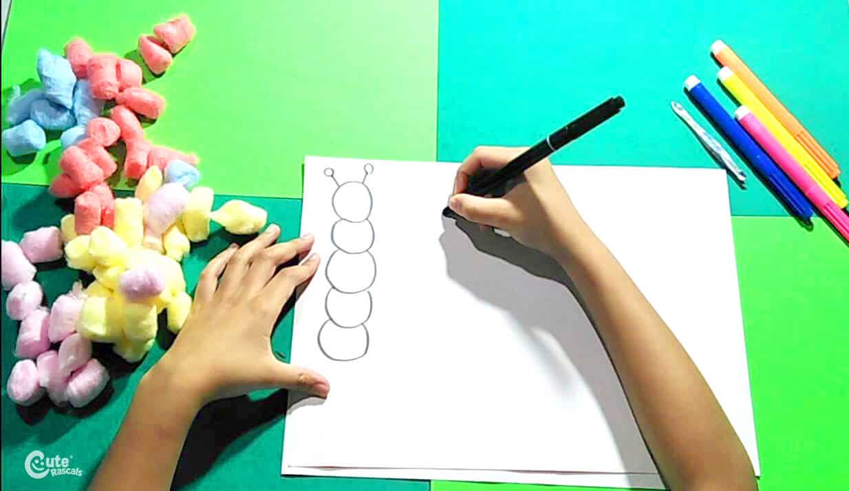 draw worms using the black marker 