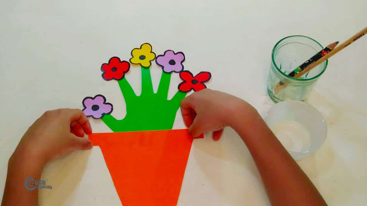Paste the flowers on each finger. Fun spring crafts for kids