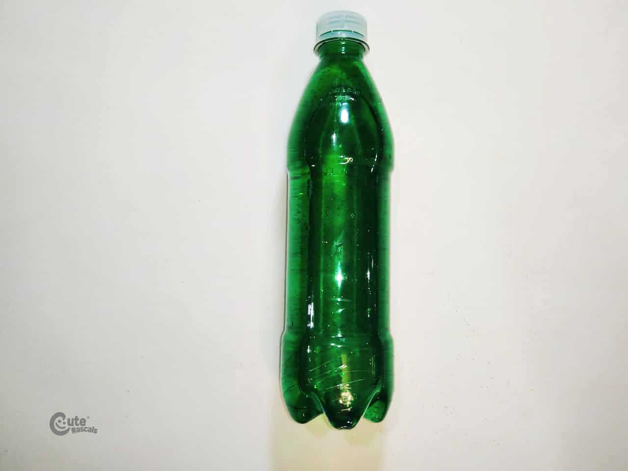  Green sensory bottle made with different materials