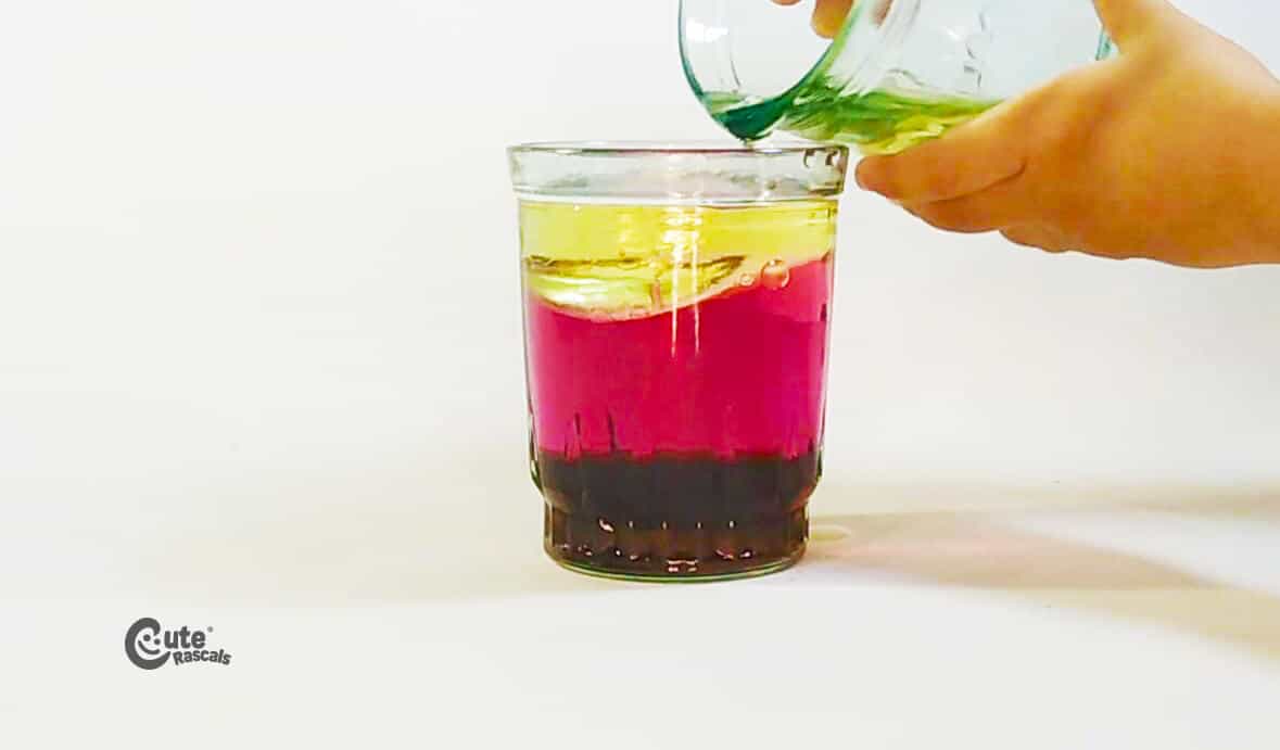 Pour the oil into the container. easy kids science experiments