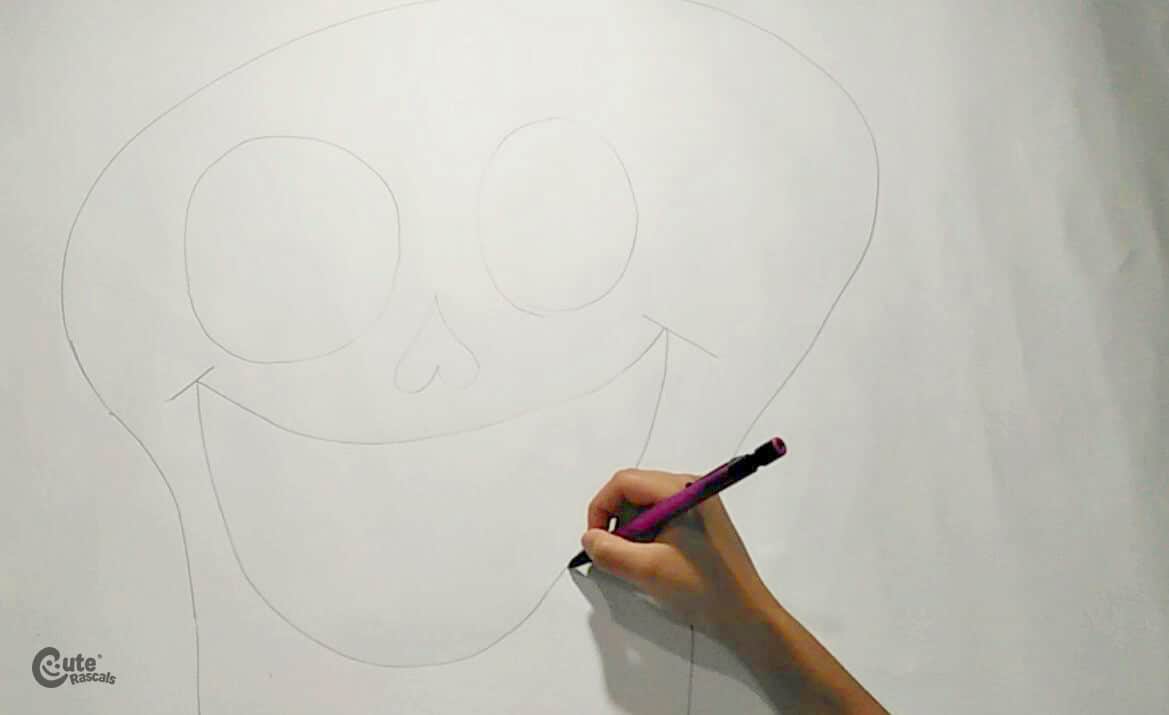 Draw a skeleton face in the cardboard