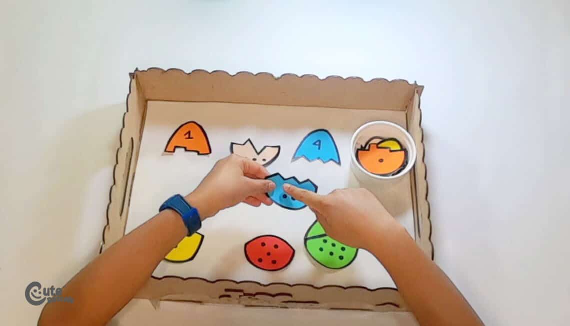 Take the egg's parts according to the number. Montessori math number activities for preschoolers