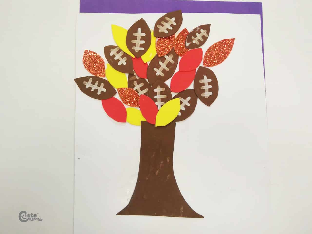 Foamy tree decorated using football-shaped leaves. Easy football crafts for kids