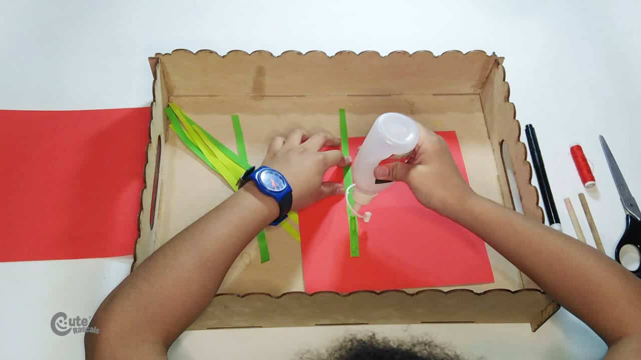 Glue a paper strip. Fun cool crafts with paper