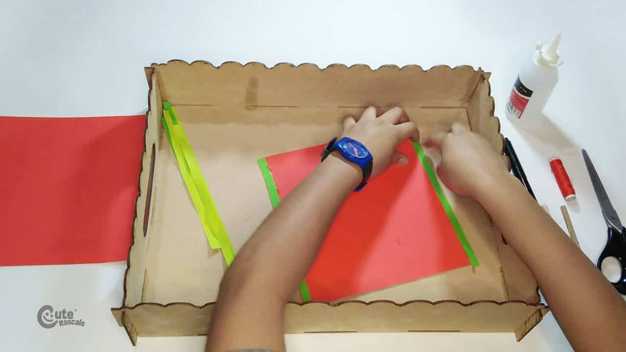 Glue a paper strip at each end of a sheet